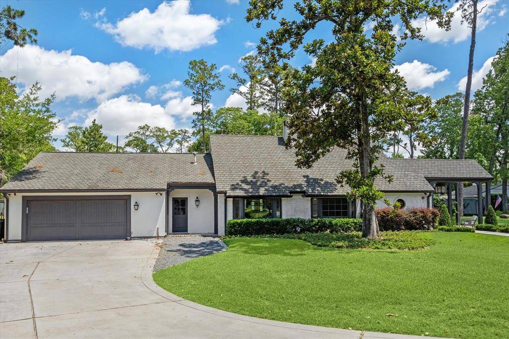 The home has a 2-car attached garage and ample space for parking.