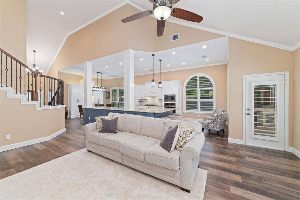 Open to the kitchen and dining areas, the living room is designed for both entertaining and everyday comfort.