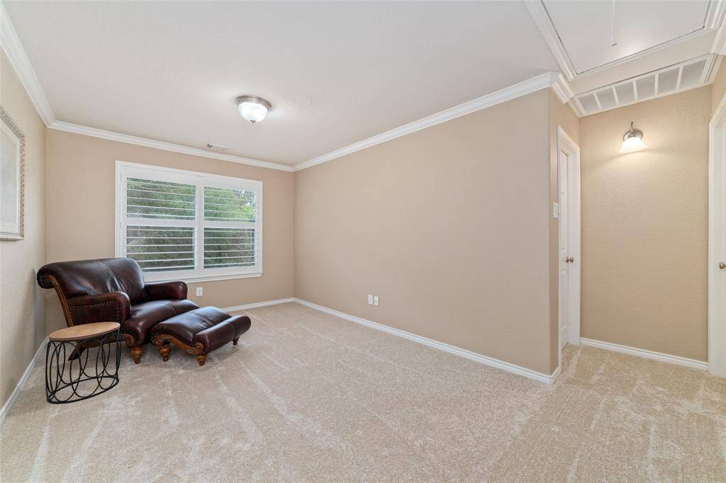 The large game room upstairs offers a perfect space for media, play, or study.