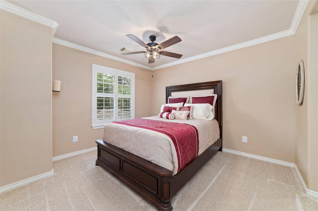 Three spacious bedrooms are located upstairs, each with fresh carpet replaced in 2025.