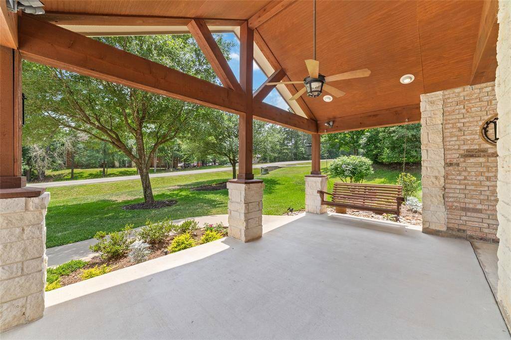 A cozy front porch swing invites you to slow down and soak in the peaceful surroundings.