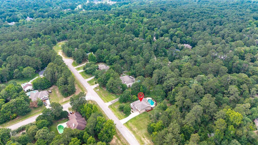 This home is tucked away in a quiet, secluded neighborhood, offering a tranquil, country-like atmosphere.