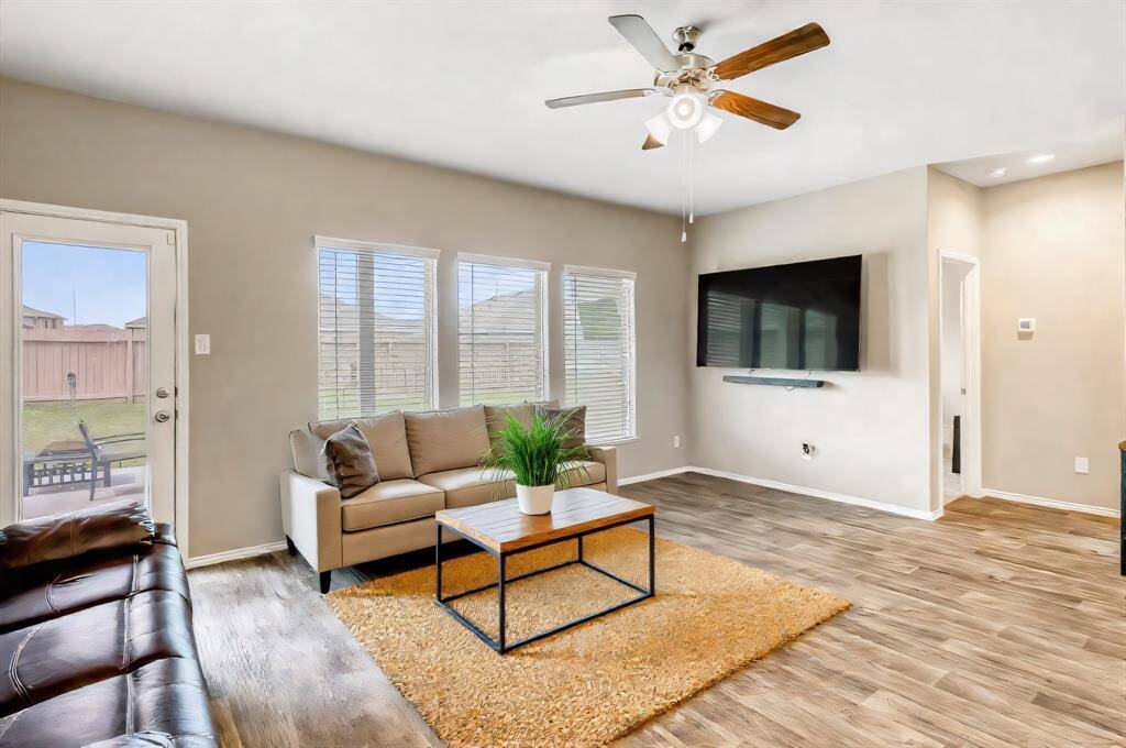 Showing the potential of this large family room! *virtually staged