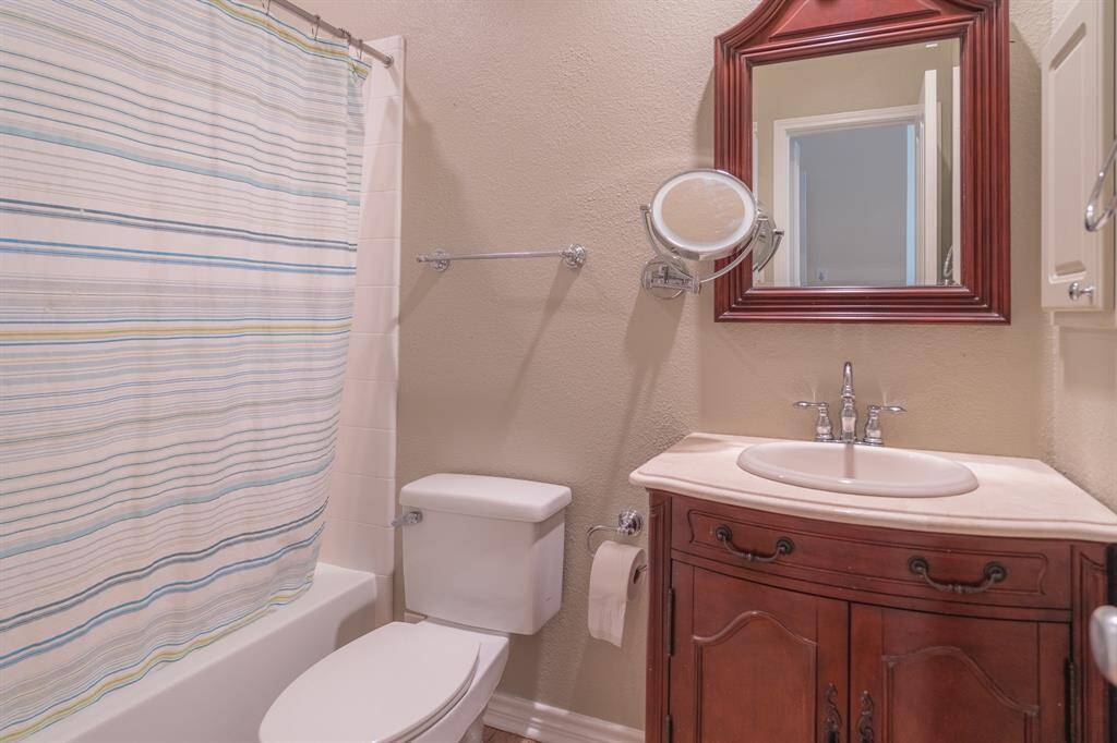 Ensuite bath for secondary bedroom down.