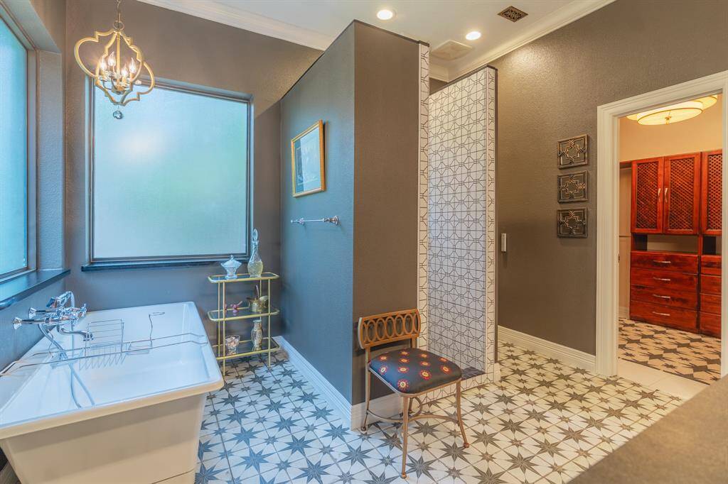 Primary bath with soaking tub and seperate shower.