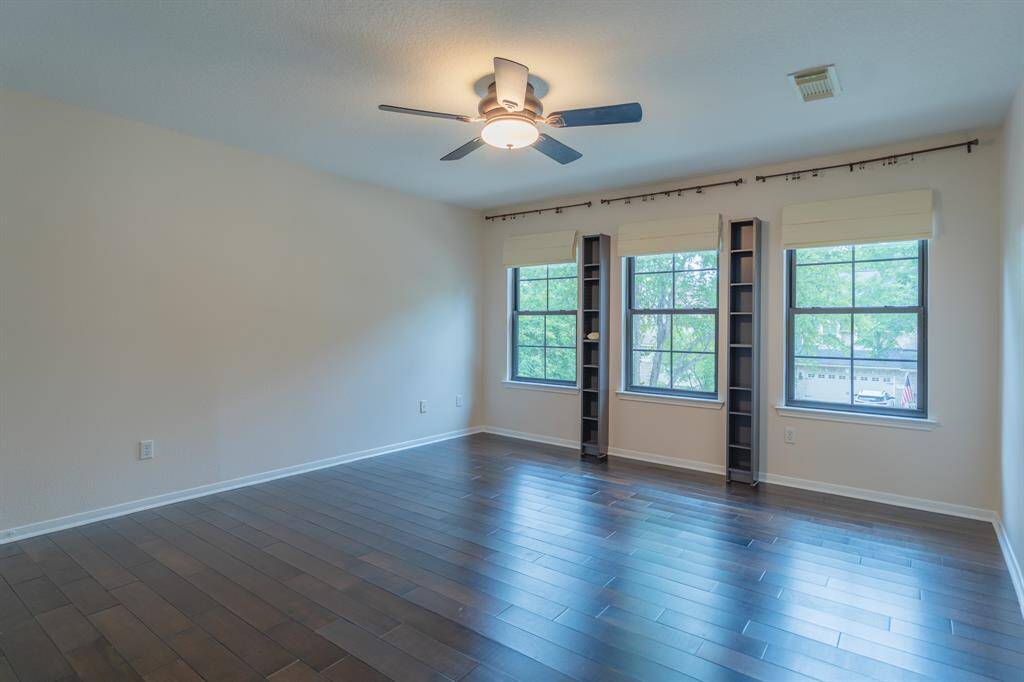 Additional bedroom up with gorgeous views of the front yard.
