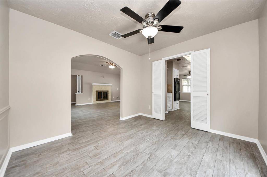 Elegant formal dining room conveniently located adjacent to the kitchen, perfect for hosting gatherings and special occasions.