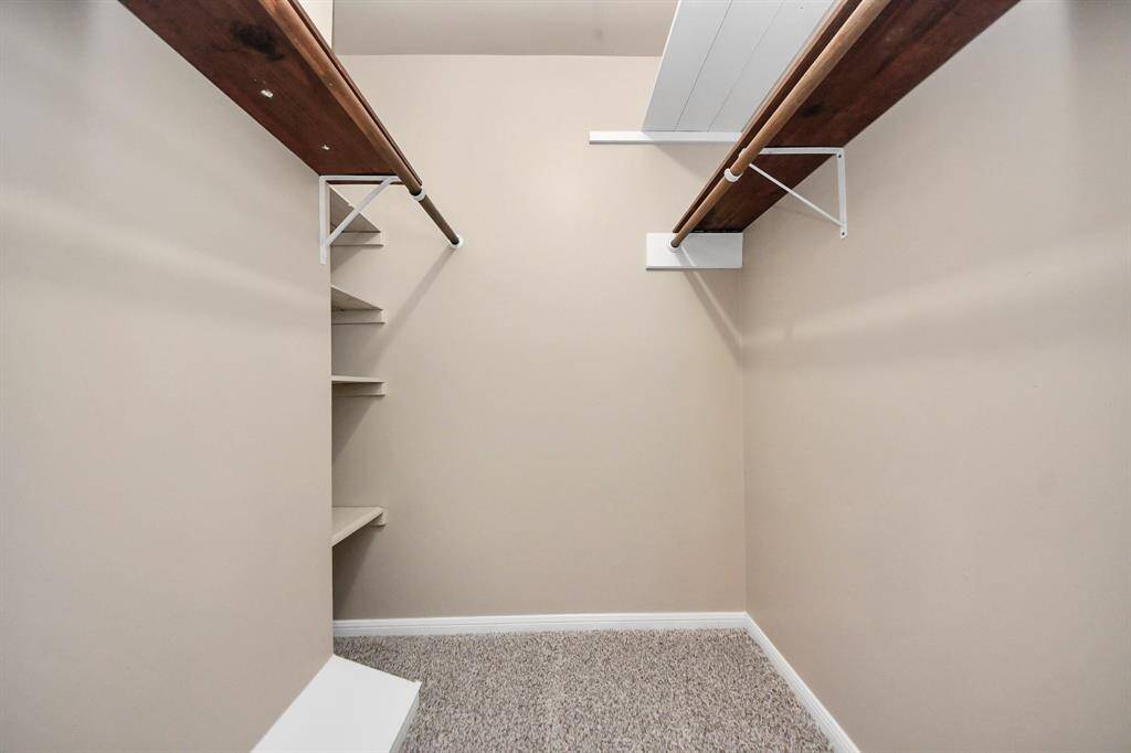 Walk-in closet in the primary bedroom, providing generous space for all your storage needs.