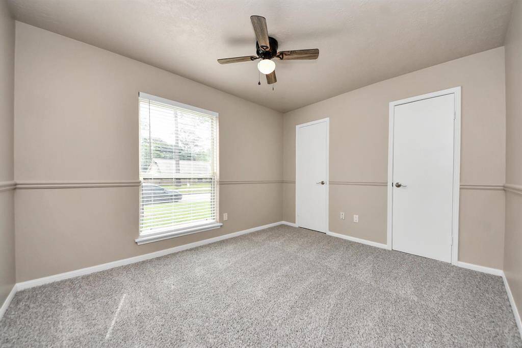 Bedroom #2 features a spacious double closet, offering ample storage and versatility.