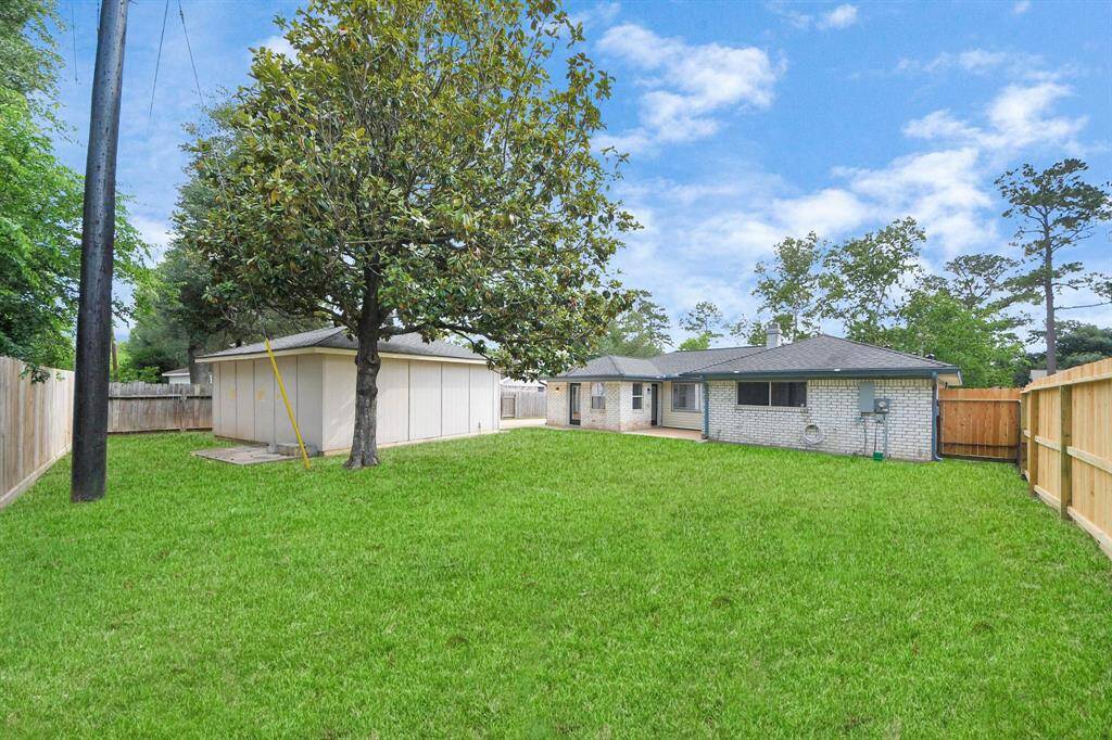 Spacious, fully-fenced backyard perfect for hosting gatherings, outdoor activities, or simply enjoying a private retreat.