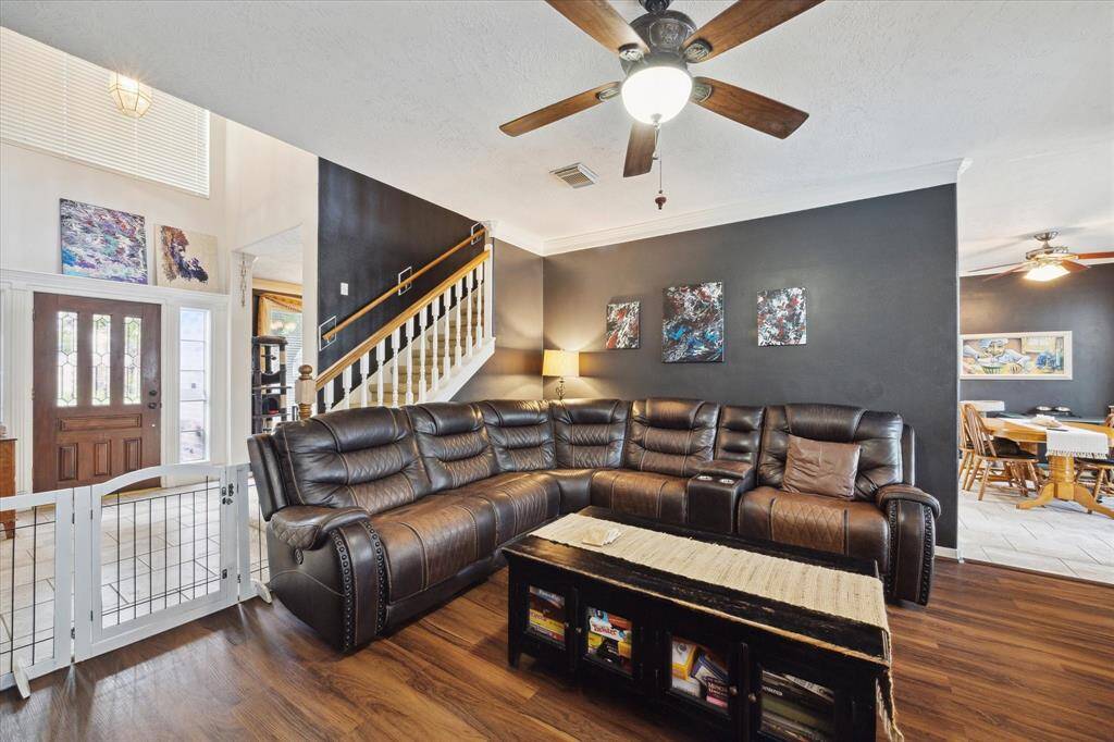THE DEN FEATURES RECENTLY INSTALLED, LOW MAINTENANCE LUXURY VINYL PLANK FLOORS.