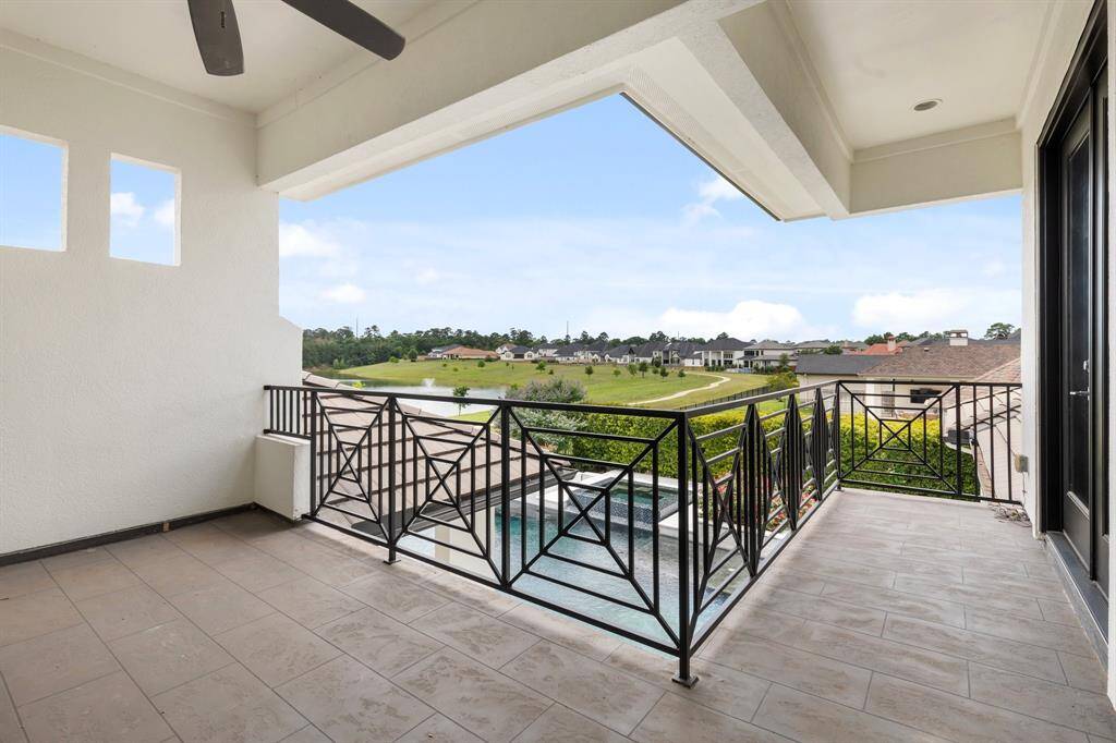Connecting two beautifully appointed bedrooms, the upstairs balcony serves as a serene retreat, offering panoramic views and a refreshing outdoor space.