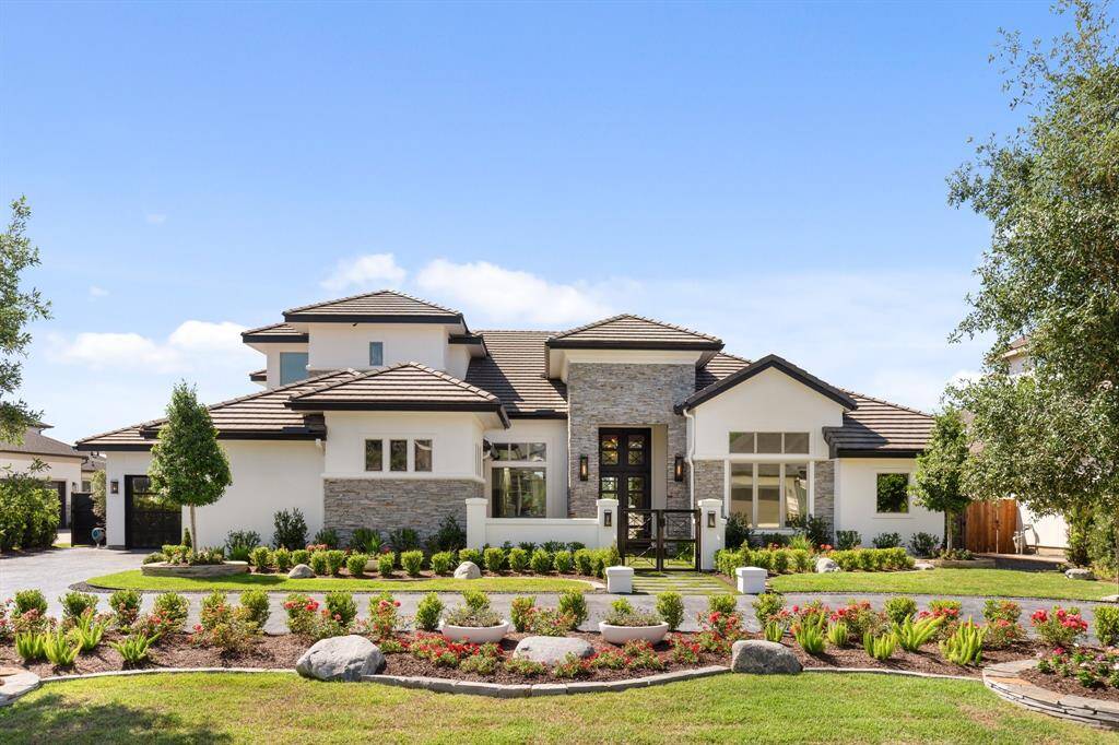 This extraordinary waterfront estate presents over 6,200 square feet of luxurious living space on an expansive half-acre lot