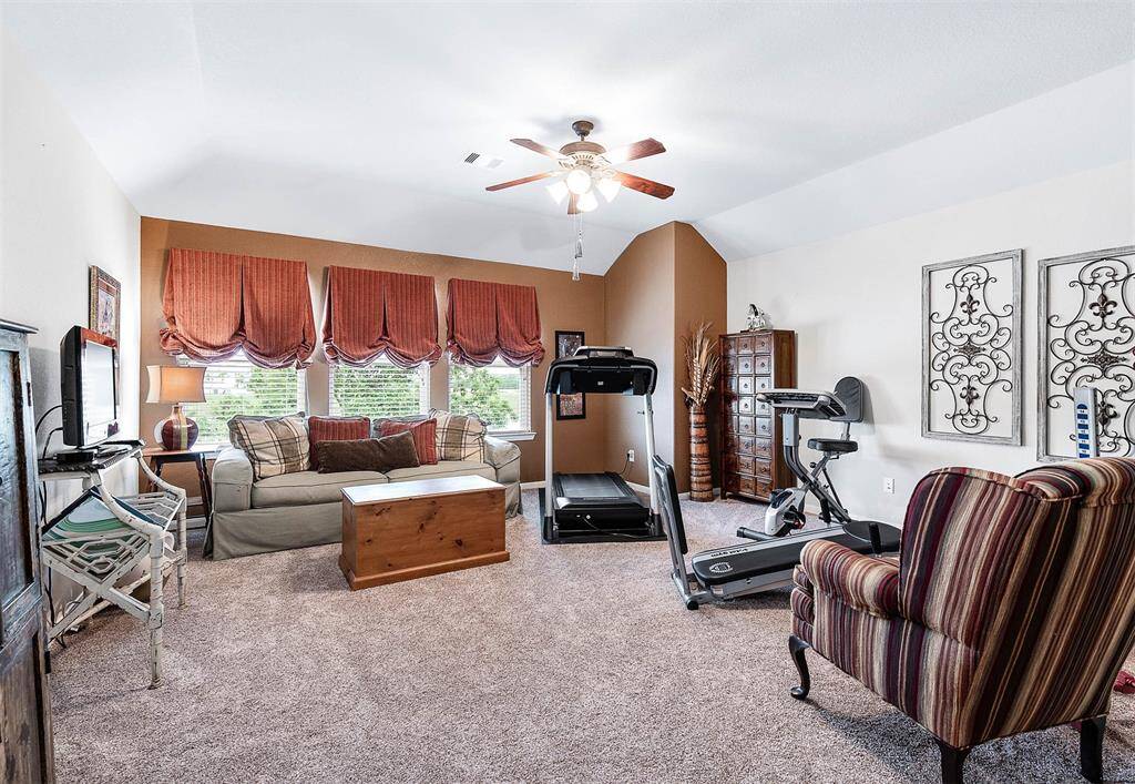 Exercise, movies and lots of fun can be found here. The wall of windows overlook the lake.