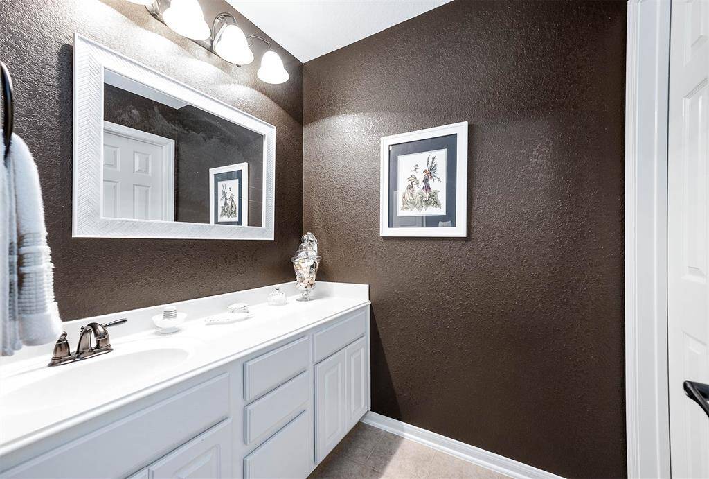 Hall bath:  the third full bathroom on the second floor.