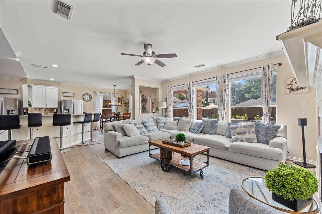 Experience the ease and flow of open-concept living, where the kitchen, breakfast, and living areas blend seamlessly for everyday comfort and entertaining.