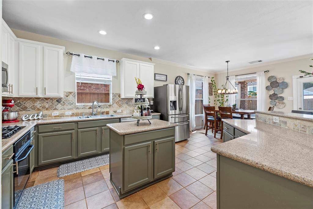 Lots of granite counter space and tons of cabinet storage space.