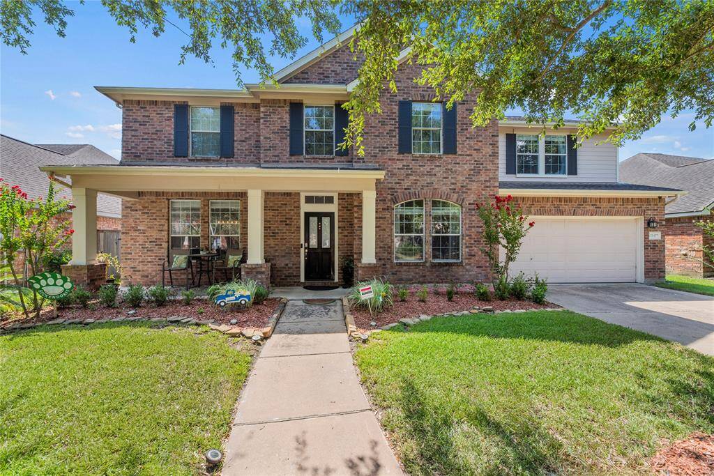 Welcome home to 23427 Whispering Wind.