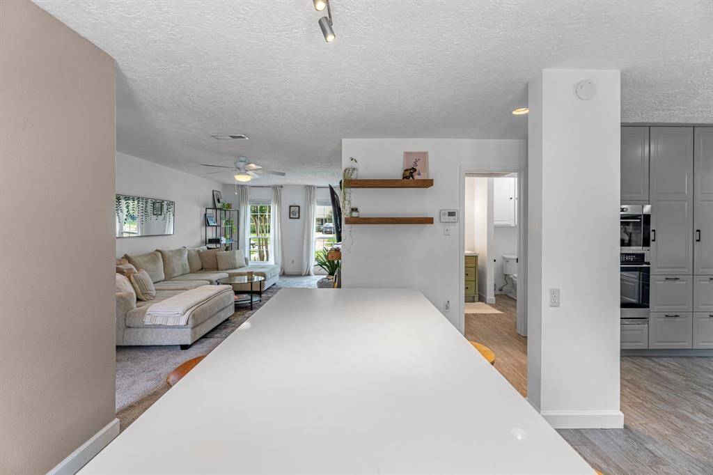 Large kitchen Island offers ample prep space & additional storage
