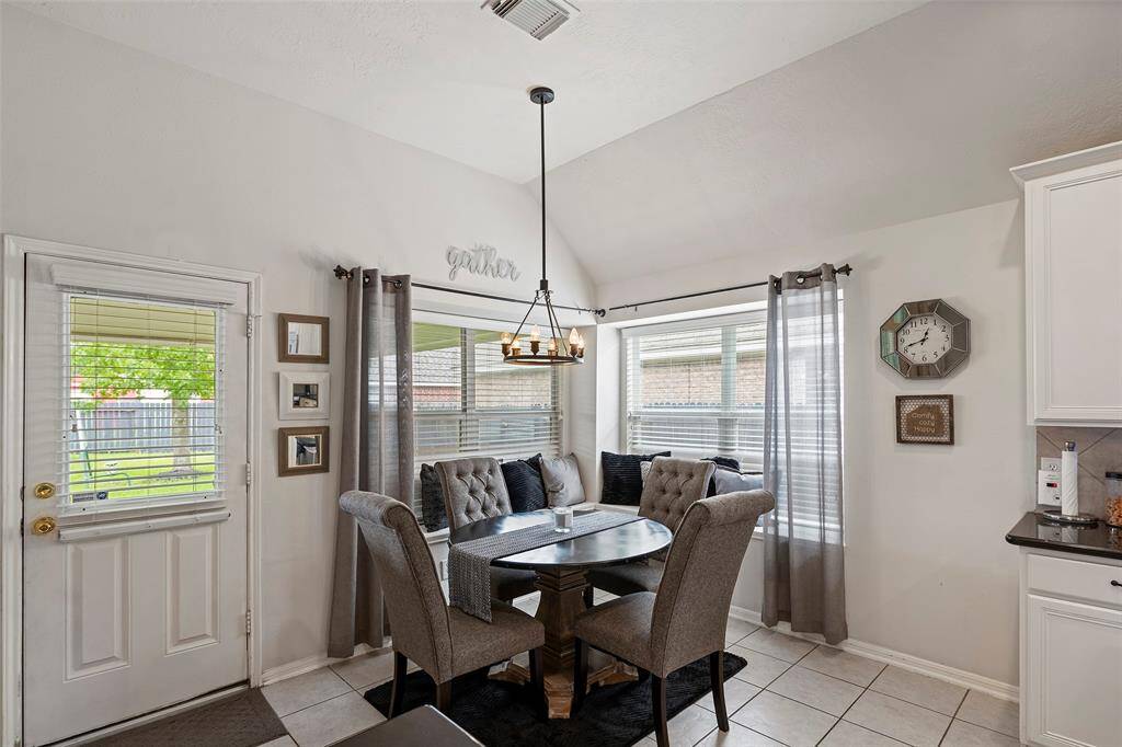 Updated Lighting throughout the home in 2024. Breakfast Room.