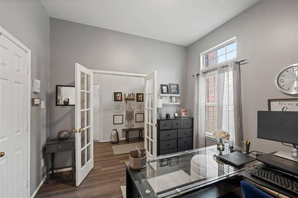 Home Office with French doors and closet. Could be a 4th Bedroom.