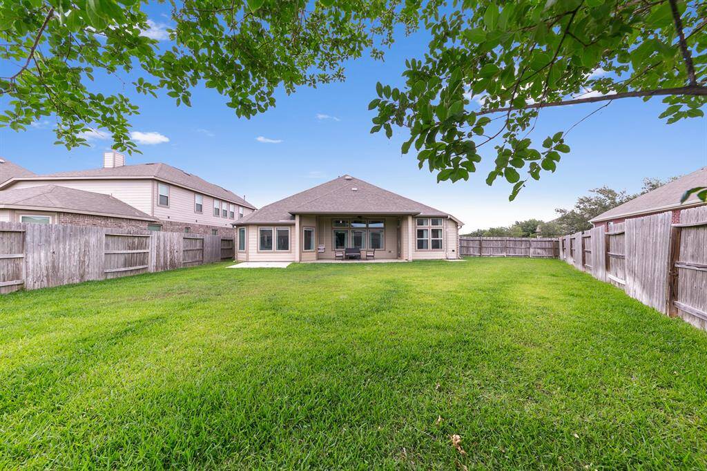 A corner home, a huge lot, fresh paint, and even a water softener...You have everything you need all under one roof. Welcome home!