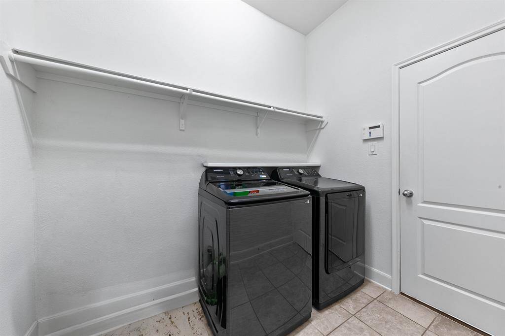 Add a bench and some hooks and you'll have a convenient spot to kick off shoes and store bags for the evening.