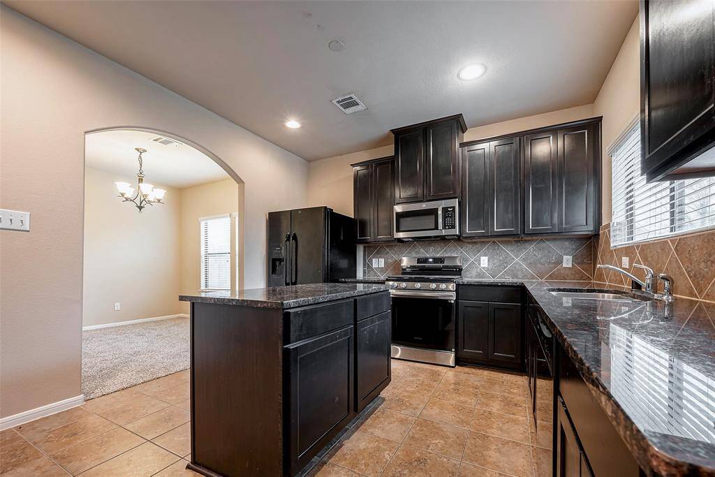 Kitchen with stainless steel appliances