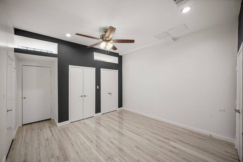 Double closets on each side of the room