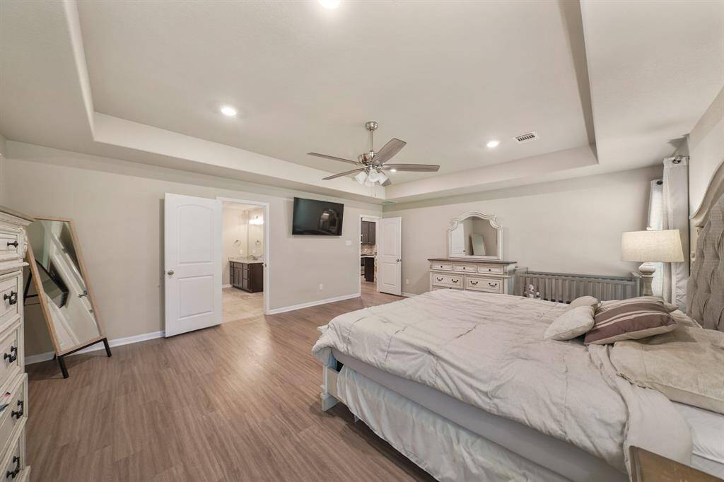 Another angle shows how spacious the room is, and is complete with an en-suite bathroom.