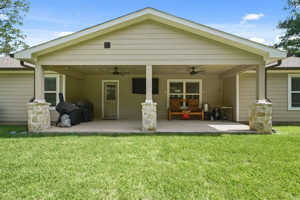 Check out this patio! It is perfect for entertaining family, friends, and guests.