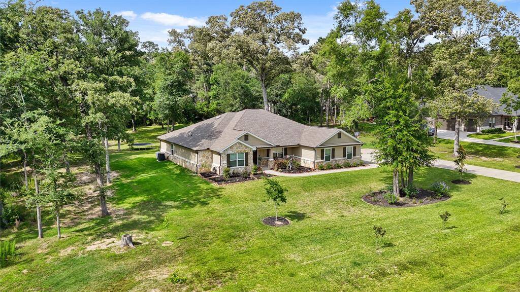 2-car garage with long driveway.