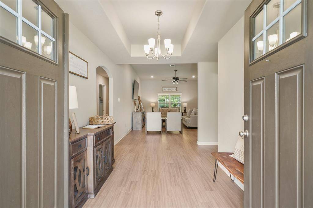 You'll be instantly greeted by gorgeous vinyl floors.