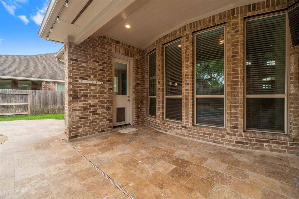 Covered patio with travertine
