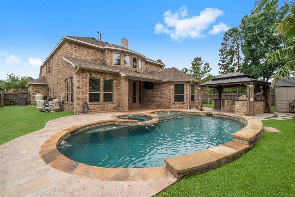 Pool and built in outdoor kitchen