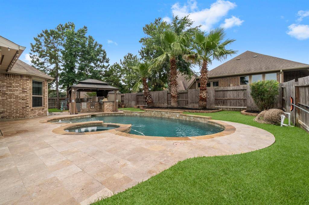 Pool and built in outdoor kitchen