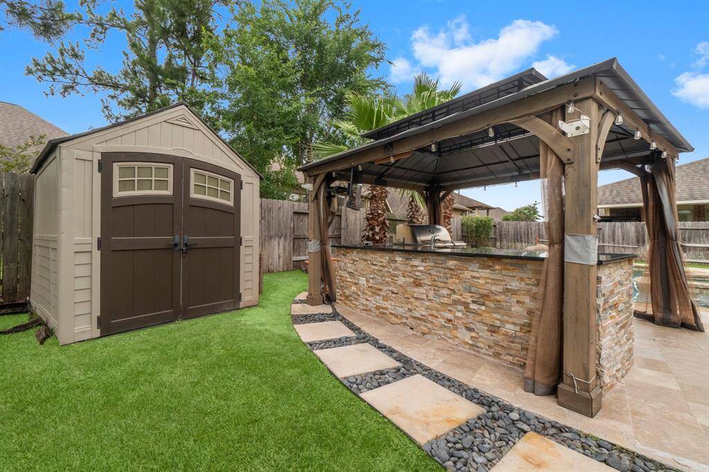 Storage shed and outdoor kitchen