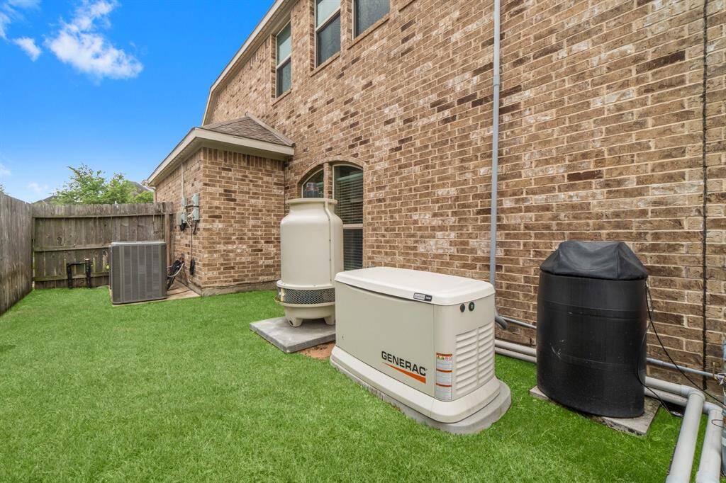 Side yard and Generac generator