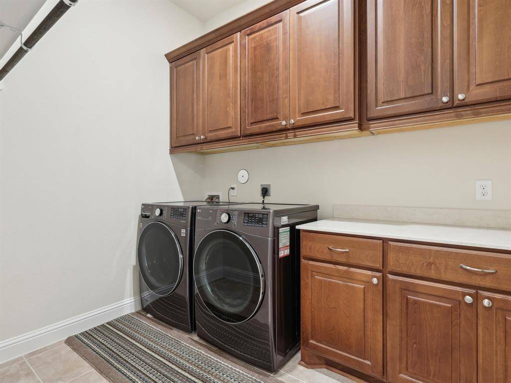 Laundry Room with upgraded cabinets and countertop