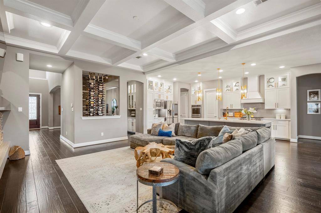 The heart of the home is its open-concept kitchen and living area, ideal for entertaining or relaxing with family.