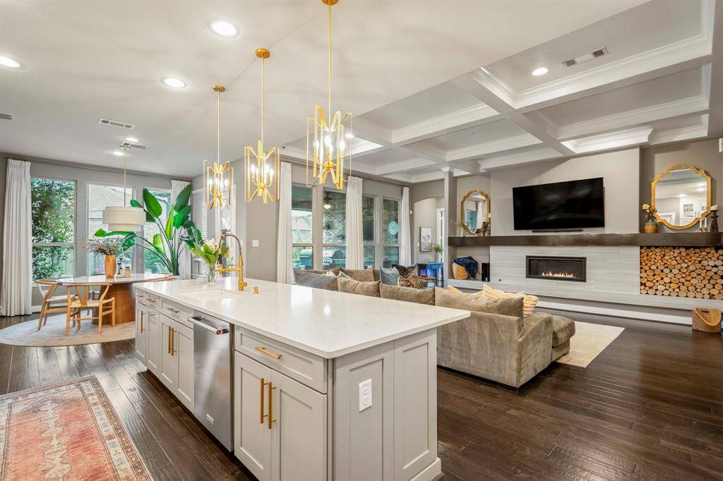 This kitchen will not disappoint! There is plenty of storage and counterspace making this kitchen every chef's dream! It opens to the family room and breakfast nook making it perfect to host any event or holiday!