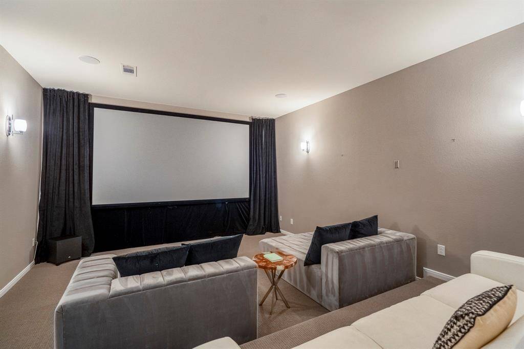 Grab the popcorn, put on a movie, and enjoy a wonderful evening in your amazing media room! The media room is fully equipped wtih surround sound, built in speakers, and custom screen, making the perfect spot for binge-watching, gaming, or enjoying the big game.