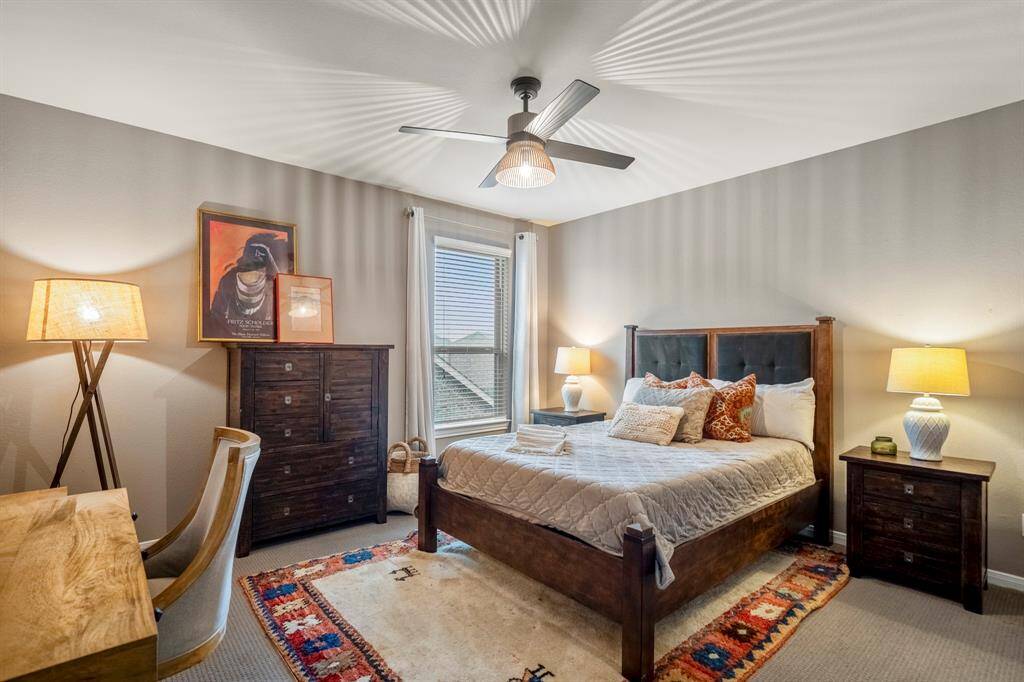 Warm and inviting, this spacious secondary bedroom offers plenty of room for relaxation and personalization, making it the perfect retreat for family or guests.