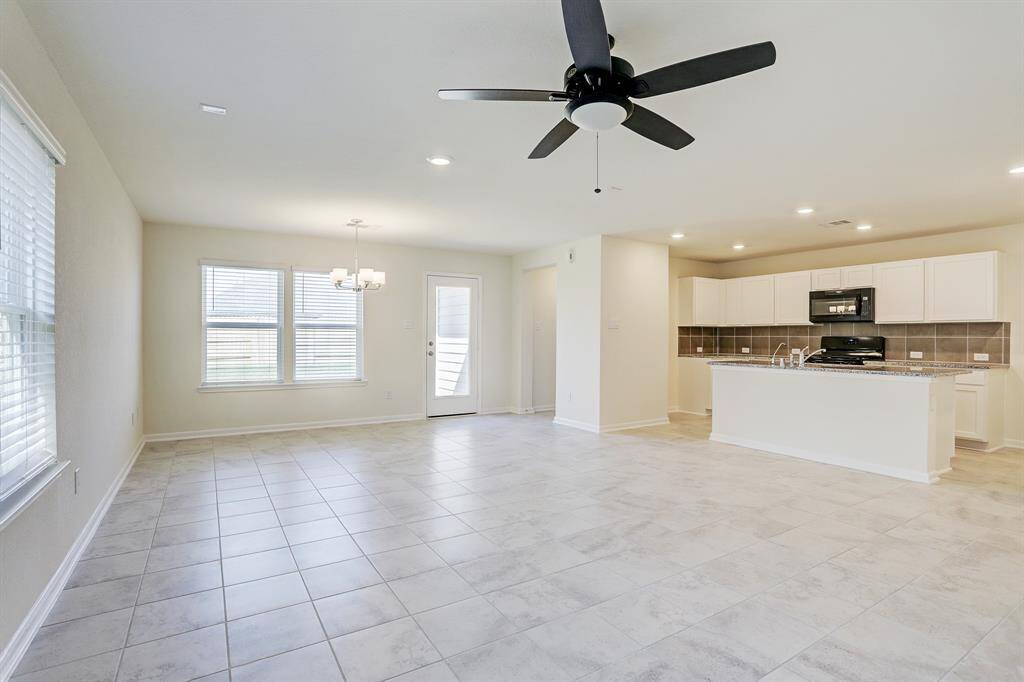 Family room opens to kitchen. Notice all the natural light!