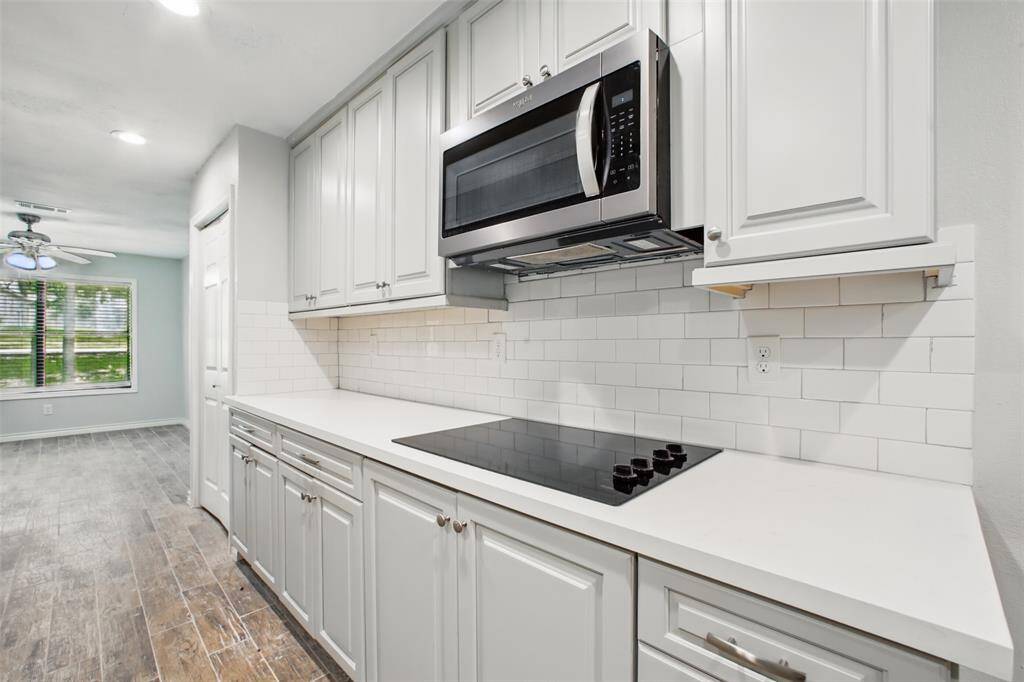 Bright, clean, and thoughtfully laid out, this kitchen with new stainless steel appliances is as beautiful as it is functional—ready to support your daily rhythm.