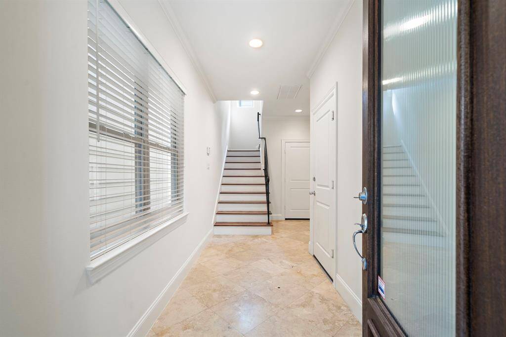 Water resistant tile on the first floor for indoor/outdoor living.