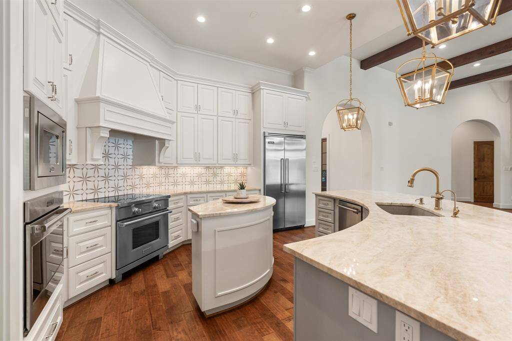 Additional highlights include painted cabinetry, a new Bosch dishwasher, and high end stainless steel appliances.