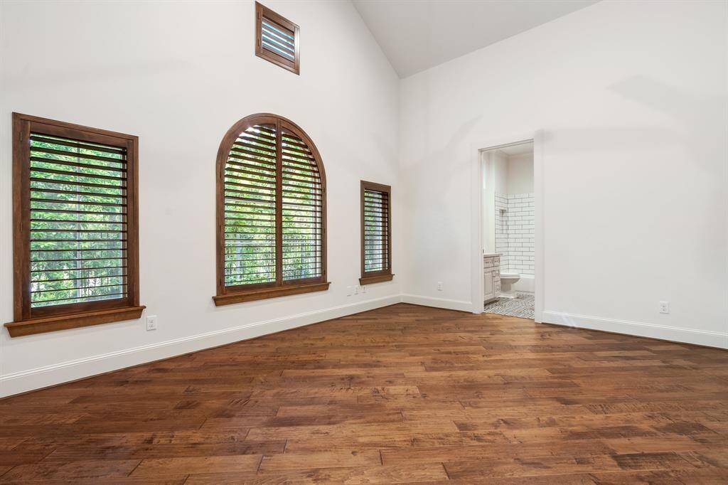 1st of 3 additional Secondary Bedrooms, this one is oversized with en suite bath that has been completely remodeled!