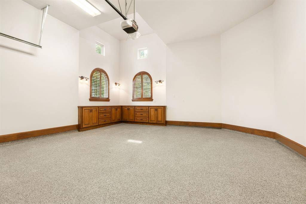 Garages are finished out with new epoxy flooring, built-in storage and generous windows for plenty of natural light. 2-Car.