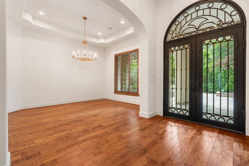 Interior enjoys warm wood flooring complimented by a freshly painted interior.